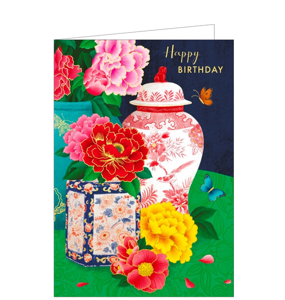 This stunning birthday card is decorated with a colourful butterflies fluttering around an arrangement of pots and flower heads. Gold text on the front of the card reads 