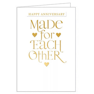 This beautiful anniversary card is decorated with embossed gold text that reads "Happy Anniversary...made for each other".
