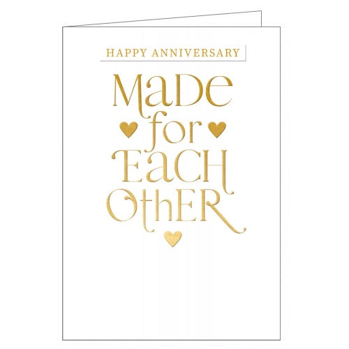 This beautiful anniversary card is decorated with embossed gold text that reads 