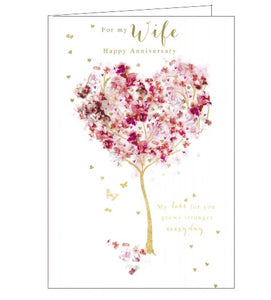 This lovely anniversary card for a special wife is decorated with a heart-shaped tree with pink flowers and golden branches. Gold text on the front of the card reads "For my Wife...Happy Anniversary...my love for you grows stronger every day".