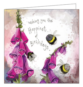 Part of Alex Clark's "Sunshine" birthday card collection. This birthday card is decorated with Alex Clark's illustrations of smiling bumble bees buzzing around pink foxgloves. Look carefully and you might see a bee gathering nectar. Gold text on the front of the card reads "Wishing you the Happiest of Birthdays x".