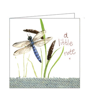 Part of Alex Clark's "Little Sparkle" collection, of smaller sized greetings cards. This card features a glittery dragonfly among the reeds. Red text on the front of the card reads "a little note x"