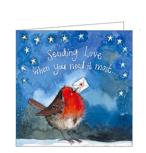 Part of Alex Clark's Christmas card collection. This petite Christmas card is decorated with Alex's painting of a robin holding a christmas card in its beak. Silver text on the front of the card reads "Sending Love when you need it most...".