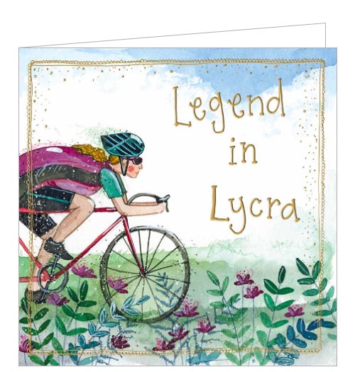 Part of Alex Clark's Sunshine greetings card collection, this lovely greetings card is decorated with an illustration of a cyclist with a blond ponytail powering through the countryside. Gold text on the front of the card reads “Legend in Lycra“.