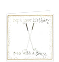 Part of Alex Clark's "Little Sunshine" Collection, of smaller sized Birthday cards. This birthday card features cute illustration of a crossed pair of golfing irons with gold balls on either side. Gold text on the front of the card reads "Hope your Birthday goes with a swing".