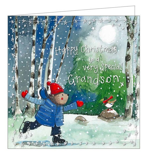 Part of Alex Clark's Christmas card collection. This Christmas card is decorated with Alex's painting of a hedgehog, wearing a coat and hat, on its hind legs, skating in a snowy forest clearing. SIlver text on the front of the card reads 