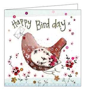 Part of Alex Clark's "Sparkle" greetings card collection - finished with a dusting of glitter. This birthday card is decorated with Alex Clark's wonderful flower-patterned bird carrying a card in its beak, Text on the front of the card reads "Happy Bird Day"