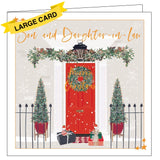 This beautiful Christmas card for a special daughter and son in law is decorated with a scene of a red front door, flanked by christmas trees. Two robins perch on christmas gifts left on the doorstep. Gold text on the front of the card reads "Daughter and Son-in-Law".