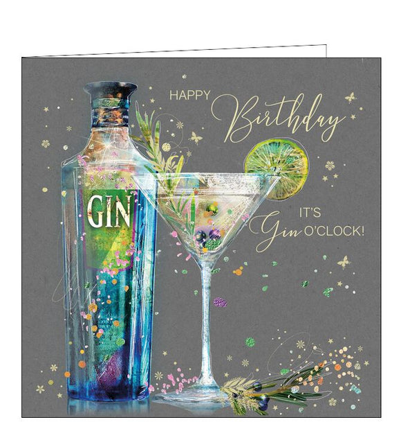 This birthday card is decorated with a bottle of gin beside a cocktail glass garnished with lime and berries. Metallic gold text on the front of the card reads 