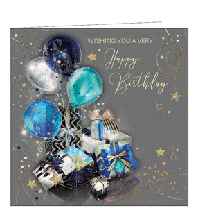 This birthday card is decorated with a stack of birthday gifts - wrapped in blue and gold paper and topped with blue and silver balloons. Metallic gold text on the front of the card reads "Wishing you a very Happy Birthday".