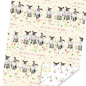 This sheet of wrapping paper designed by Louise Mulgrew features an adorable pattern of rows of spring lambs surrounded by bunting, flowers and text that reads "lots of love this springtime". The reverse side of the paper is covered in tulips, daffodils and spring flowers.