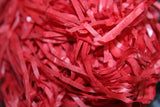 Red shredded tissue paper