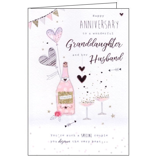 This wedding anniversary card for a special granddaughter and her husband is decorated with an illustration of a bottle of champagne and two fizzing coupes. Rose gold text on the front of the card reads 