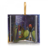 A decoration and a Christmas read in one, this lovely tiny little 48-page book contains the lyrics to the classic Christmas song "We Three Kings", complete with illustrations to match the lyrics.  This book measures 9cm x 7.5cm and comes with a ribbon loop to hang it on the Christmas tree.