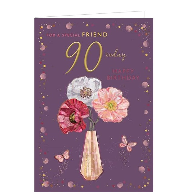  This 90th birthday card for a special friend is decorated with a rose-gold case holding three pink and white flowers.The text on the front of the card reads 