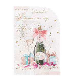 This lovely birthday card for a special lady is decorated with a bottle of pink champagne surrounded by pink and gold confetti and streamers. Rose-gold text on the front of this birthday card card reads "For the most Wonderful Woman in my Life".