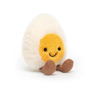 Sunny side up! This adorable boiled egg soft toy from Jellycat has white fur, a smiling yellow yolk face and super-soft corduroy legs. This toy measures approximately 14cm x 8cm and is suitable for children of all ages, from birth and upwards.