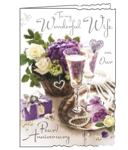 Jonny Javelin greetings cards combine detailed illustrations with heartfelt messages. This 30th Anniversary card for a special wife is illustrated with a table set with champagne and flowers. The text on the front of the card reads 