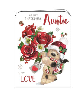 The text on the front of this Jonny Javelin Christmas card reads "Happy Christmas Auntie with love" while Fudge, a knitted dog, holds out a bouquet of red roses.