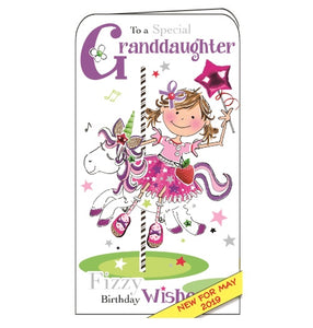 This birthday card from Jonny Javelin features an illustration of a young girl in a party dress and with a magic hand on a carousel. The text on the front of the card reads "To a special Granddaughter...fizzy Birthday wishes".