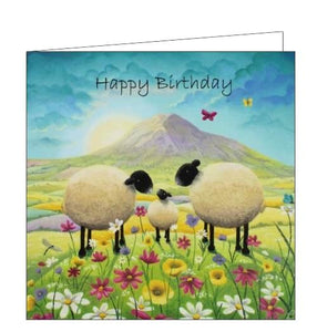 Featuring detail from and original pastel drawing by Lucy Pittaway, this birthday card shows a family of sheep in a field of flowers, with text above that reads "Happy Birthday"