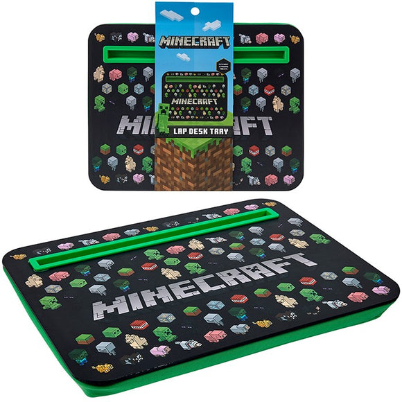 Calling all blockheads! Perfect for school work, gaming or snacks on the sofa, this licenced lap tray is decorated with characters and blocks from the Minecraft game - can you spot wolves, zombie villagers or TNT blocks? This tray has a slot to securely hold pens or a tablet and a contrasting non-removable green foam back to ensure comfort and stability during use.