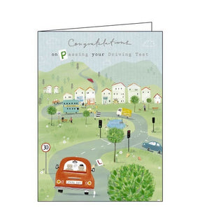 This congratulations card is decorated with a scene of a car driving into a town, throwing the 'L' plates out of the car window. The text on the front of the card reads "Congratulations on passing your driving test".