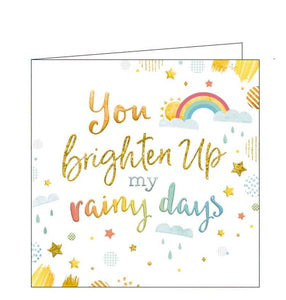 This cute little card is decorated with metallic and glittery stars, rainbows and clouds. Metallic, multicoloured text on the card reads "You brighten up my rainy days".