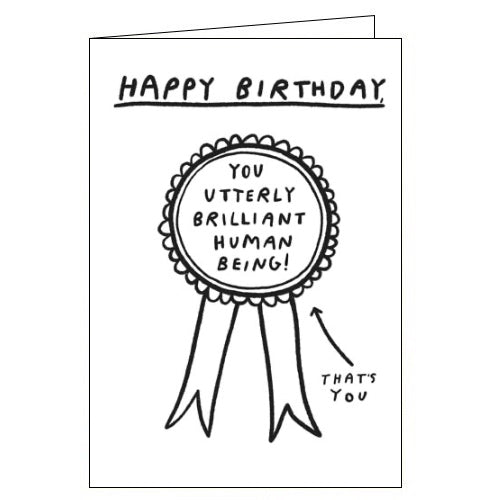 This cute birthday card is decorated with a black and white drawing of a rosette that reads 