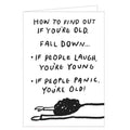 This funny birthday card is decorated with a sketch of someone lying on their front. The caption on the front of the card reads "How to find out if you're old, Fall down... If people laugh, you're young...If people panic, You're old!"