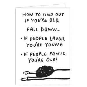 This funny birthday card is decorated with a sketch of someone lying on their front. The caption on the front of the card reads "How to find out if you're old, Fall down... If people laugh, you're young...If people panic, You're old!"