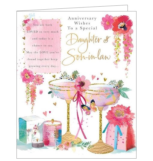 This lovely anniversary card for a special daughter and son in law is decorated a pair of glittery golden champagne coupes garnished with flowers and surrounded by gifts. The text on the front of the card reads “Anniversary Wishes To a Special Daughter & Son-in-law...you are both LOVED so very much and today is a chance to say, May the LOVE you've found together keep growing every day....”