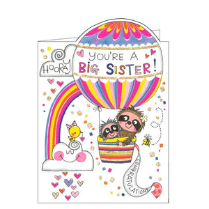 This adorable card to celebrate becoming a big sister is decorated with a scene of a pair of sloths floating up into the sky together in the basket of a pink hot air balloon. The text on the front of this card reads "Hooray, you're a Big Sister...Congratulations". 