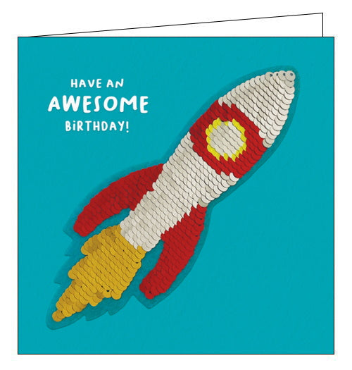 A card and a gift in one! This card features a rocketship sequin patch that can be removed and added to bags, jackets and more. The text on the front of the card reads 