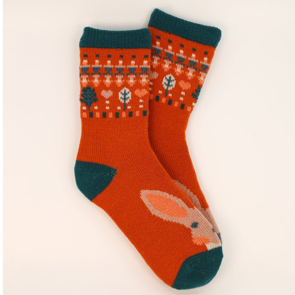 This pair of ladies ankle socks from fashion brand Powder feature a cute rosy-cheeked hare across the top of the foot and a woodland fair isle band above the ankle.