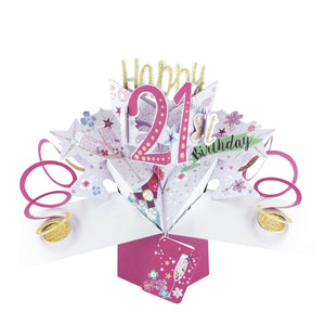 A spectacular pop-up 3D keepsake 21st birthday card, that opens to unleash bright pink streamers, glittering stars, champagne bottles and text that reads "Happy 21st Birthday".