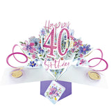 A spectacular pop-up 3D keepsake 40th birthday card, that opens to unleash pink streamers, delicate flowers and text that reads "Happy 40th Birthday".