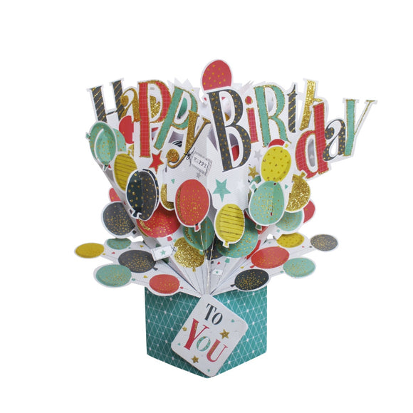 Pop-up 3D birthday card that opens up to reveal a huge bunch of glittery red, yellow, black and green balloons. Text on the card reads 