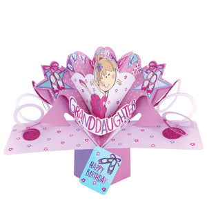This pink pop-up 3D keepsake card is decorated with a cartoon of a young ballerina in a pink tutu. Text on the card reads "Beautiful Granddaughter...Happy Birthday".