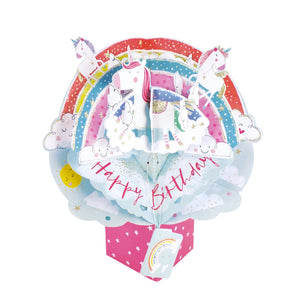 This unicorn themed pop-up 3D keepsake card is decorated with clouds, unicorns and a glittery rainbow. Text on the card reads "Happy Birthday".