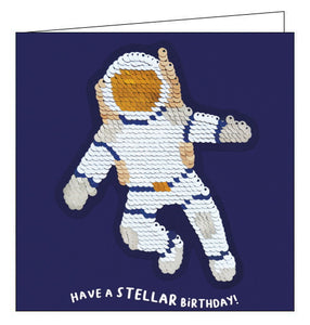 A card and a gift in one! This card features an astronaut sequin patch that can be removed and added to bags, jackets and more. Text on the front of the card reads "Have a STELLAR Birthday!"