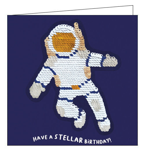 A card and a gift in one! This card features an astronaut sequin patch that can be removed and added to bags, jackets and more. Text on the front of the card reads 