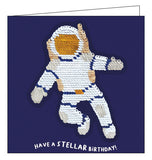 A card and a gift in one! This card features an astronaut sequin patch that can be removed and added to bags, jackets and more. Text on the front of the card reads "Have a STELLAR Birthday!"