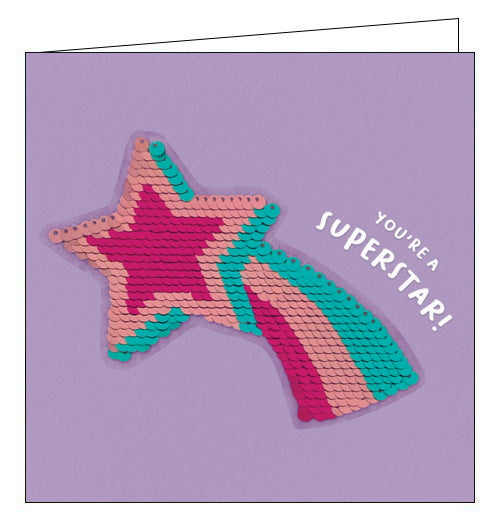 A card and a gift in one! This card features a shooting star sequin patch that can be removed and added to bags, jackets and more. Text on the front of the card reads 