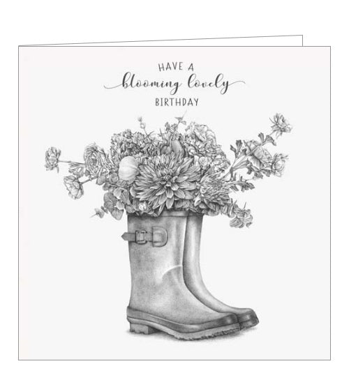 This sweet greetings card from Pigment Production's Life in Pencil card range is decorated with a black and white sketch of a pair of flower-filled wellington boots. The caption on the front of the card reads 