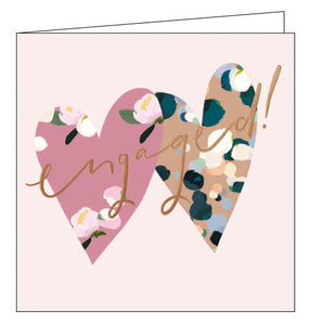 This lovely engagement card from Woodmansterne cards collaboration with designer Stephanie Dyment is decorated with a pair of overlapping love hearts, covered in flowers and confettis. Rose gold text on the front of the card reads "engaged!"