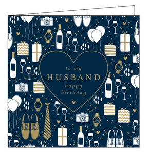 This birthday card for a special Husband is decorated with an array of tiny white and gold balloons, wine and gifts - including cameras, watches, shoes and ties - against a rich blue background. The text on the front of the card reads "To my Husband...Happy Birthday"
