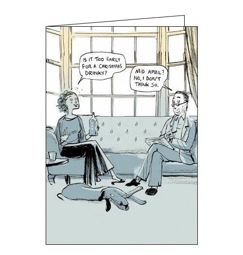 This funny blank greetings card features a cartoon of a couple sitting together on the sofa. The woman holds up a bottle of alcohol and asks 