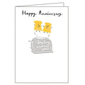 This cute anniversary card is decorated with two smiling slices of toast leaping up from a metallic toaster. Text on the front of the card reads "Happy Anniversary...toasting another year!"