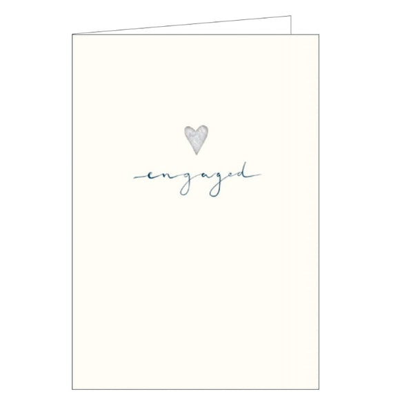 This simple and elegant engagement card is decorated with a tiny silver heart and blue script that reads 